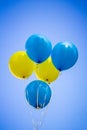 Yellow and blue balloons on the background of the sky. Ukrainian Royalty Free Stock Photo