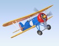 Yellow and blue biplane flying in the sky Royalty Free Stock Photo