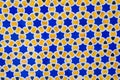 yellow and blue ceramic tiles with an abstract geometric pattern. Background with uzbek ornament Royalty Free Stock Photo