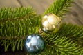 On the Christmas tree next to hang yellow and blue balls, the colors of the flag of Ukraine. Yellow and blue Christmas Royalty Free Stock Photo