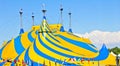 A yellow and blue circus tent. Royalty Free Stock Photo