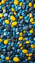 Yellow-blue color pebbles sea stones abstract background Royalty Free Stock Photo