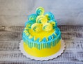 Yellow and blue cream cheese cake with merengues Royalty Free Stock Photo