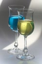 Yellow and blue drinks in glasses Royalty Free Stock Photo