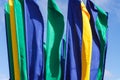 Yellow, blue and green flags on the sky background Royalty Free Stock Photo