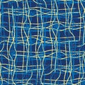 Yellow and blue hand drawn strands of fibre lines in grid design. Seamless geometric vector pattern on blue background