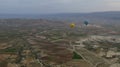 Yellow and Blue Hot Air Balloons Flying Over Cappadocia