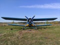 Yellow and blue old biplane plane with a single piston engine and propeller Royalty Free Stock Photo