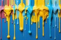 a yellow and blue paint dripping Royalty Free Stock Photo