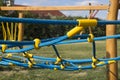 Yellow and blue rope-climbing frame Royalty Free Stock Photo