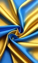 Yellow and blue silk fabric background. Close up of ripples in golden silk fabric. A gold and blue silk texture. Royalty Free Stock Photo