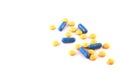 Yellow and blue tablets on a blue background