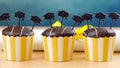 Yellow And Blue Theme Graduation Party Cupcakes With Cap Hats Toppers.