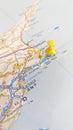 A yellow board pin stuck in Ayia Napa on a map of Cyprus portrait Royalty Free Stock Photo
