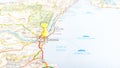 A yellow board pin stuck in Catania on a map of Sicily Royalty Free Stock Photo