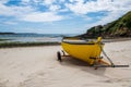 Yellow boat on a beach in Brittany Royalty Free Stock Photo