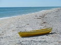 A yellow Boat on Beach Royalty Free Stock Photo