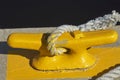 Yellow boat cleat Royalty Free Stock Photo