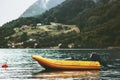 Yellow boat fjord and foggy Mountains Landscape Royalty Free Stock Photo