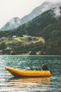 Yellow boat in sea fjord and Mountains Landscape Royalty Free Stock Photo