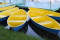 Yellow boats at pier on sunshine day