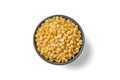 Yellow boiled peas in a ceramic bowl isolated on white background top view. Royalty Free Stock Photo