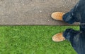 Yellow boots on the road Royalty Free Stock Photo