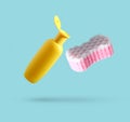 Yellow bottle of shower gel, bath sponge Royalty Free Stock Photo