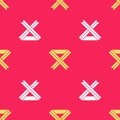 Yellow Breast cancer awareness ribbon icon isolated seamless pattern on red background. World breast cancer day concept Royalty Free Stock Photo