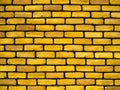 Yellow brick with black mortar. Royalty Free Stock Photo