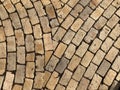 Yellow brick road. Yellow stone tiles masonry closeup background. the texture of yellow antique paving stones. Old yellow pavement Royalty Free Stock Photo