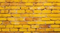 A yellow brick wall with a black fire hydrant. Suitable for urban backgrounds Royalty Free Stock Photo