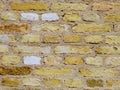 Yellow brick wall with bricks. Background or texture. Royalty Free Stock Photo