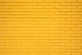 Yellow brick wall texture as background Royalty Free Stock Photo