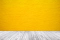 Yellow brick wall texture with wood floor background Royalty Free Stock Photo