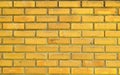 Yellow brick wall for textures background Royalty Free Stock Photo