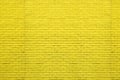 Yellow bricks pattern on wall for abstract background.