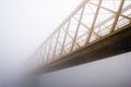 Yellow bridge in the fog Royalty Free Stock Photo