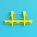 Yellow brige on bright blue background in pastel colors. Minimalism concept