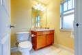Yellow bright small bathroom Royalty Free Stock Photo