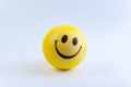 Yellow bright stress ball with isolated white background Royalty Free Stock Photo