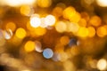 Yellow brown blurred shimmering Christmas lights Royalty Free Stock Photo