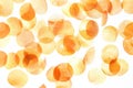 Yellow and brown circles scattered on a white background create an abstract visual effect. Royalty Free Stock Photo