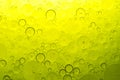 Yellow bubbles on water