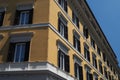 Yellow building facade with windows, Rome Royalty Free Stock Photo