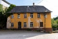 Yellow building next to the castle in Idar-Oberstein, Germany Royalty Free Stock Photo