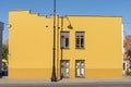 Yellow buildling four windows Klaipeda