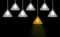 A yellow bulb standing out of the crowd. Royalty Free Stock Photo