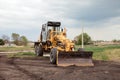 Yellow bulldozer with bucket. Wheel Loader. Heavy Equipment Machine. Tractor Front Loader. Construction Machinery Royalty Free Stock Photo