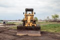 Yellow bulldozer with bucket. Wheel Loader. Heavy Equipment Machine. Tractor Front Loader. Construction Machinery Royalty Free Stock Photo